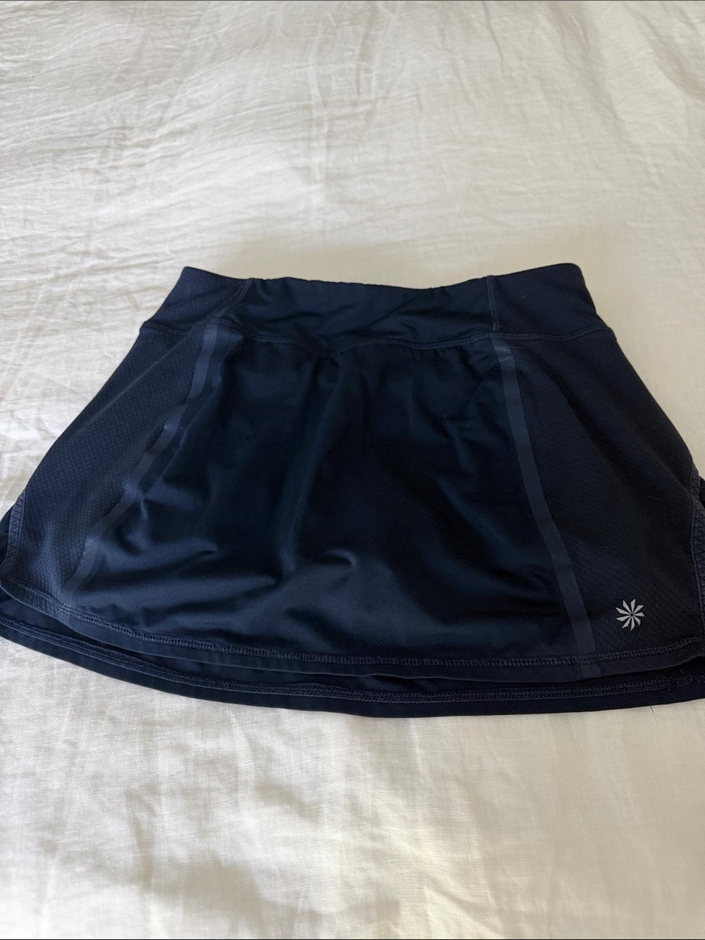 Athleta Navy tennis skirt with built in shorts